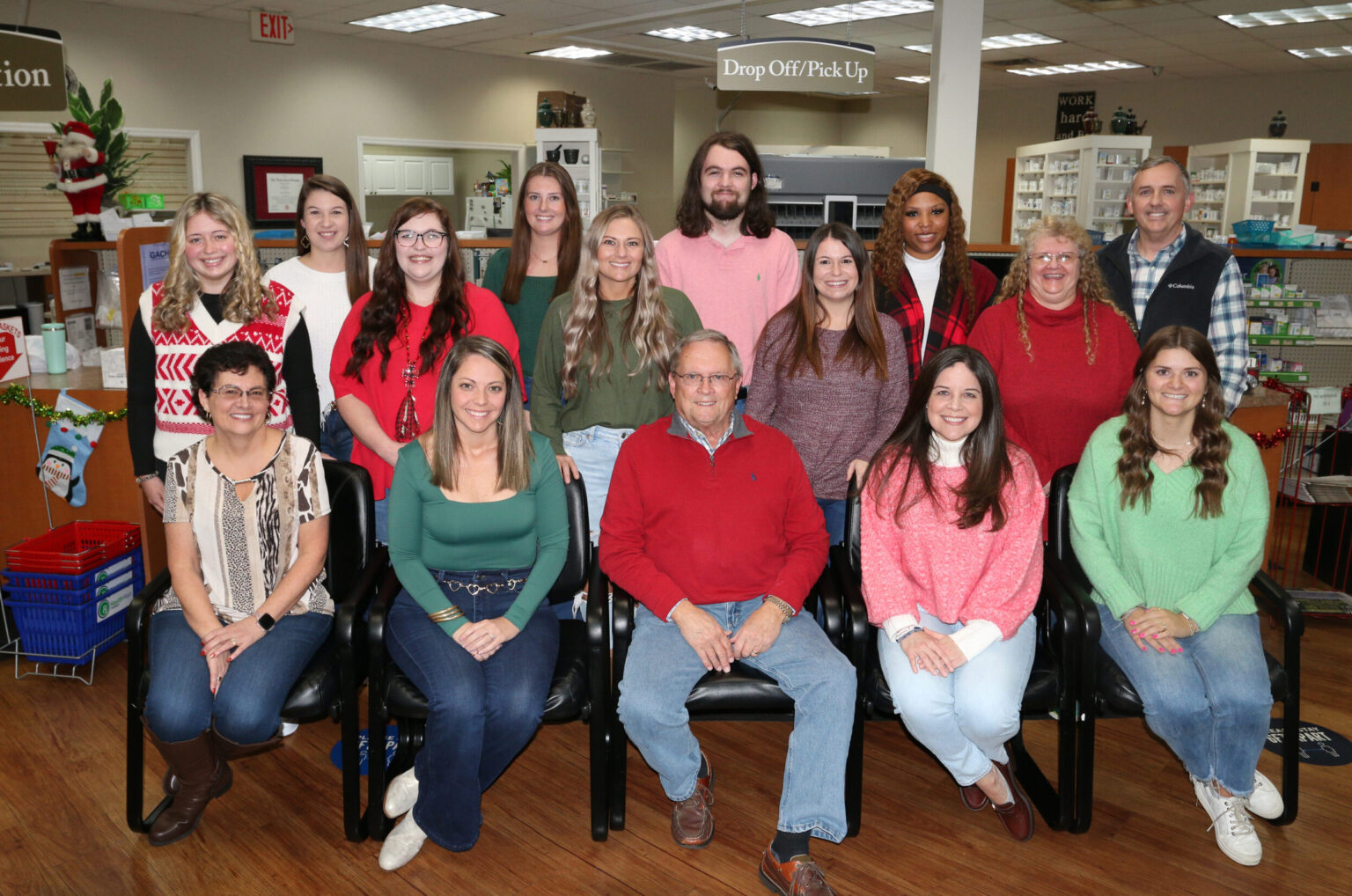 Eastman Drugs staff group inside the pharmacy